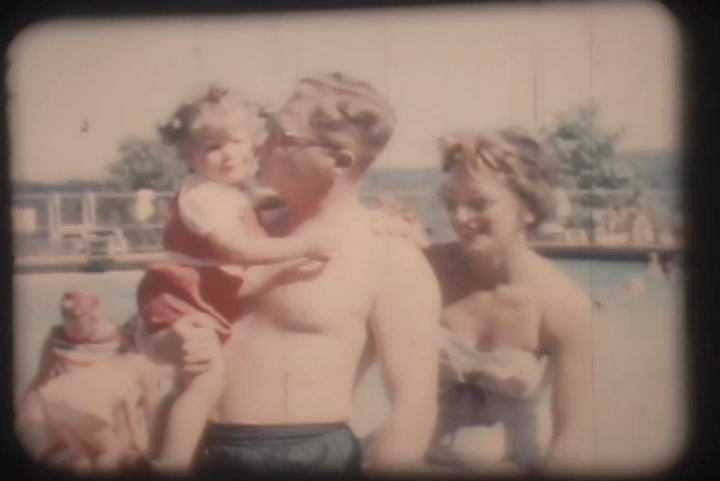 The author with her father and mother in 1955.