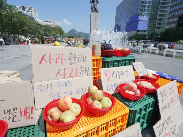 気候変動の農業への影響を訴えるプラカード