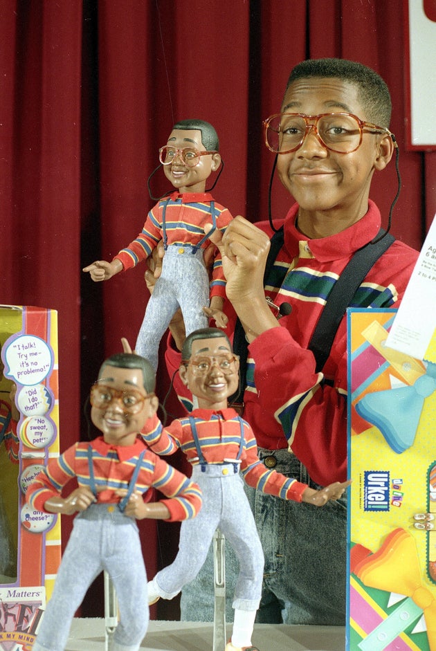 Jaleel White, in character as Steve Urkell, shows off his doll counterpart during the 1991 heyday of 