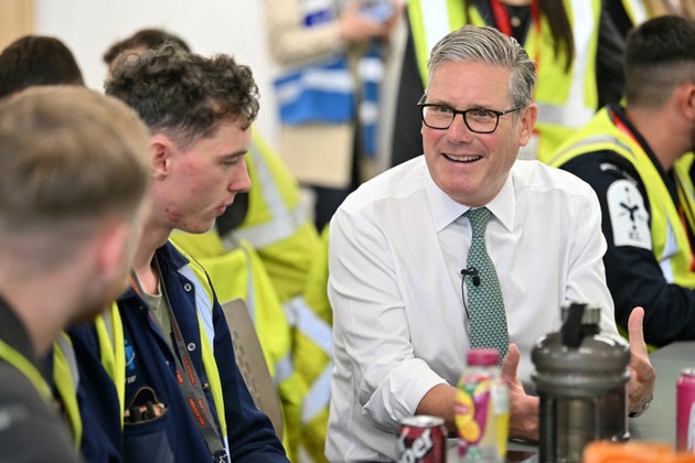 Britain's Prime Minister Keir Starmer speaks to ship builders during a visit to BAE Systems Scotstoun, in Glasgow, Scotland, Thursday, Sept. 4, 2025.