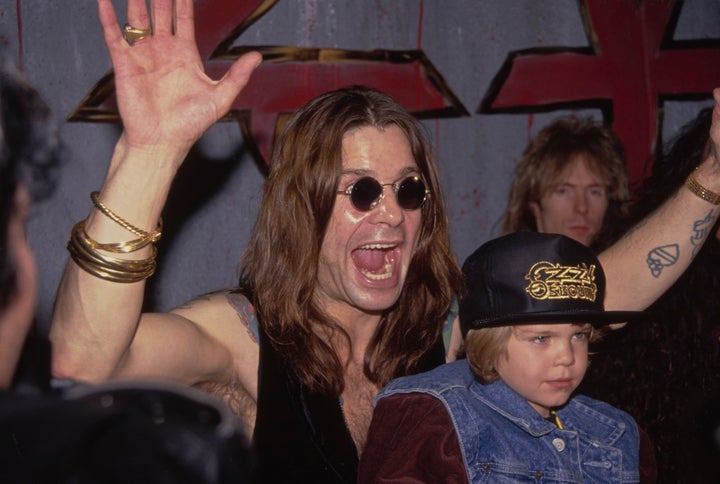 Jack, wearing an Ozzy Osbourne baseball cap, with his father at an in-store appearance at the Music Plus record store in Los Angeles on Nov. 18, 1991.