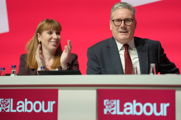 Britain's Prime Minister Keir Starmer and deputy Prime Minister Angela Rayner attend the Labour Party Conference in Liverpool, England, Monday, Sept. 23, 2024.(AP Photo/Jon Super)