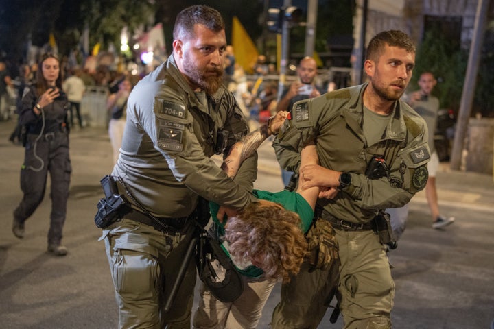 Israeli police arrest a protester in Jerusalem during a march demanding ceasefire, the release of hostages and an end to the war in Gaza, on Sept. 6, 2025.