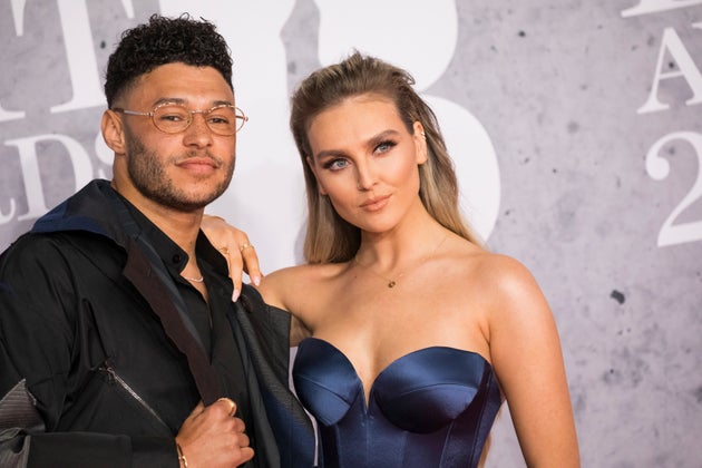 Alex Oxlade-Chamberlain and Perrie Edwards at the 2019 Brit Awards
