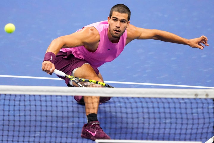 Carlos Alcaraz, of Spain, returns a shot to Jannik Sinner, of Italy, during the men's singles final of the U.S. Open tennis championships, Sunday, Sept. 7, 2025, in New York.