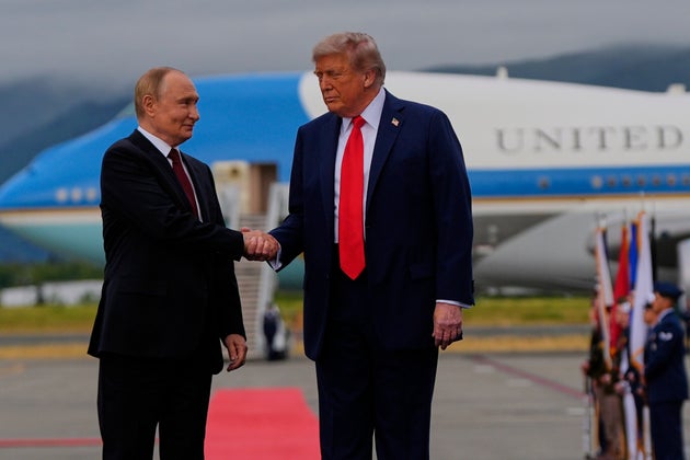 President Donald Trump greets Russia's President Vladimir Putin on Aug. 15 at Joint Base Elmendorf-Richardson, Alaska.