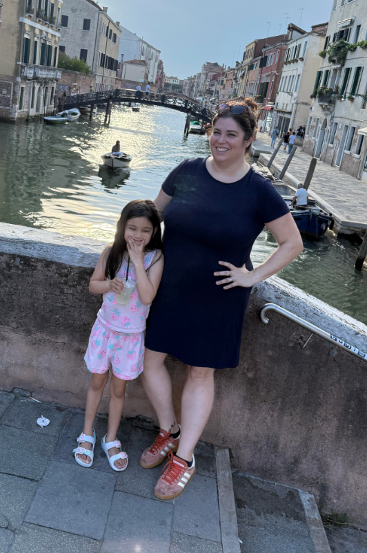 The author (right) and her daughter (left) enjoy a sunset together.