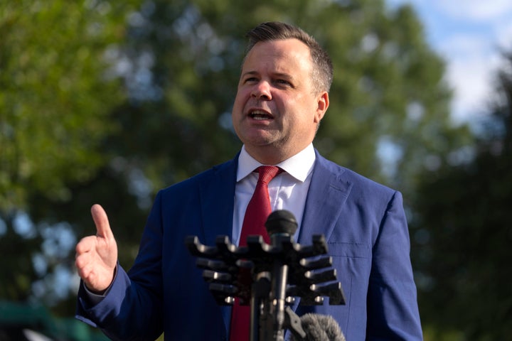 Bill Pulte, pictured speaking with reporters at the White House, was repeatedly threatened by Scott Bessent at a conservative club, Politico says.