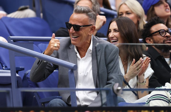 The musician Bruce Springsteen looks quite happy in the game between Jannik Sinner and Carlos Alcaraz in 2025 US Open on Sunday.