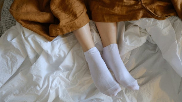 Legs in bed