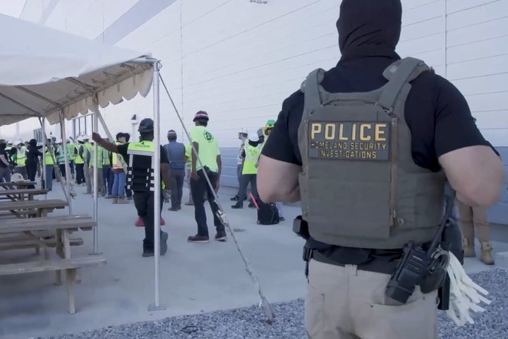 This image from video provided by U.S. Immigration and Customs Enforcement via DVIDS shows manufacturing plant employees being escorted outside the Hyundai Motor Group’s electric vehicle plant, on Sept. 4, 2025, in Ellabell, Ga.