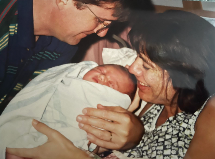 The author with Tom and newborn Jillian.