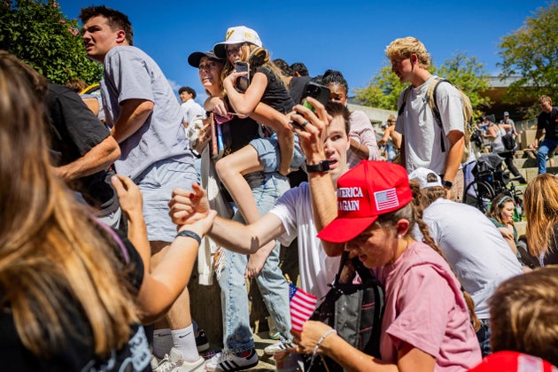 The crowd reacts after Charlie Kirk is shot at the Utah Valley University Wednesday.