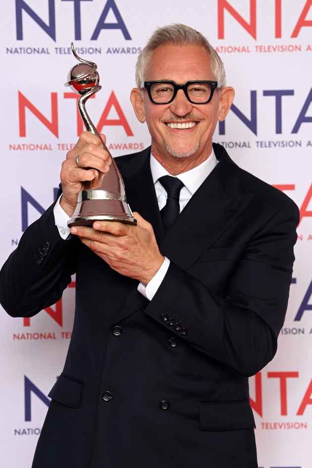 Gary Lineker posing with his National Television Award