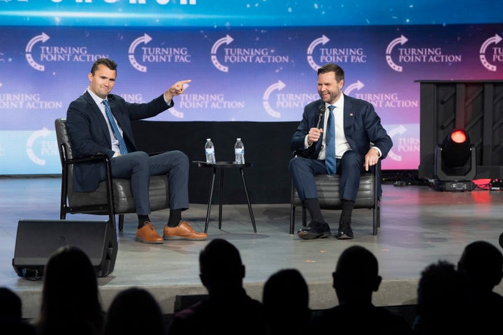 Kirk (left) moderates a conversation with then-Republican vice presidential candidate Vance during Turning Point Action's Chase the Vote campaign event at Generation Church in Mesa, Arizona, on Sept. 4, 2024.