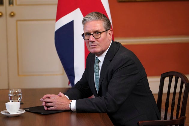 Britain's Prime Minister Keir Starmer sits at a table as he speaks to Israel's President Isaac Herzog at10 Downing Street in London, Wednesday, Sept. 10, 2025.(AP Photo/Alberto Pezzali, Pool)