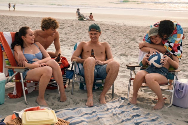 The Summer I Turned Pretty's sun-drenched setting provides escapism for fans