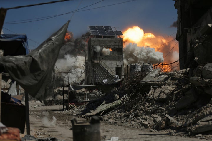Smoke and flames rise after an Israeli military strike on a building in Gaza City, Saturday, Sept. 13, 2025. (AP Photo/Yousef Al Zanoun)