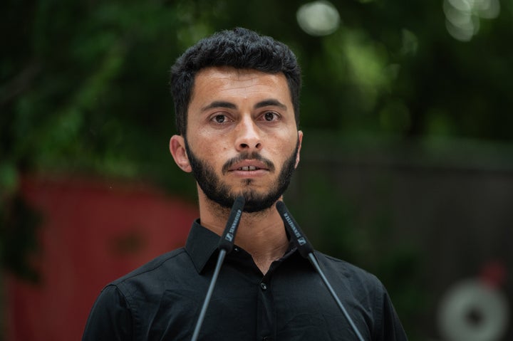 Filmmaker and Oscar-winning Palestinian director Basel Adra speaks during the meeting "Stop Genocide, Free Palestine." (Photo by Marcos del Mazo/LightRocket via Getty Images)