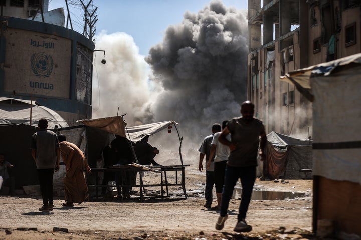 Marco Rubio Visits Israel Regardless of Trump’s Fury Over IDF Assault In Qatar 1 Palestinians run away from Israeli airstrikes that toppled multiple buildings and high-rise towers in Gaza City on Sept. 14, 2025. Dozens of civilians were killed in attacks by the Israeli military across the Gaza Strip.