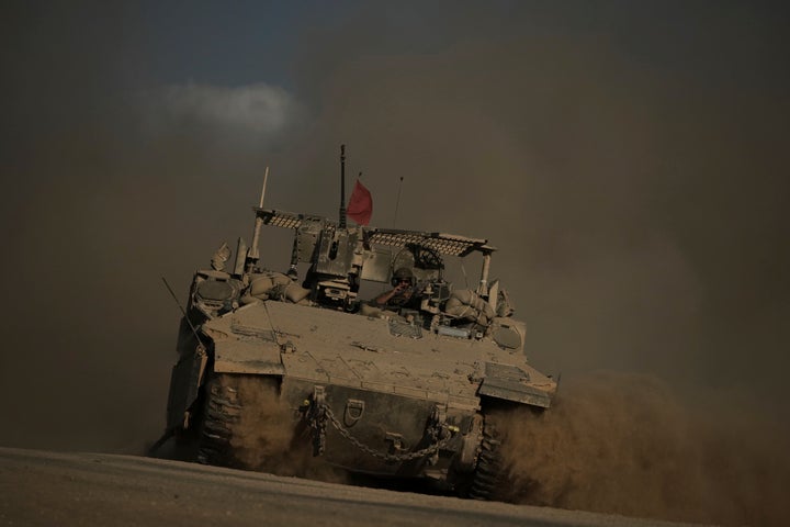 Israel's Navy Says Its Expanded Operation In Gaza Metropolis Has Begun 2 An Israeli armored vehicle moves along the Israeli-Gaza border as seen from southern Israel, on Sept. 16, 2025.