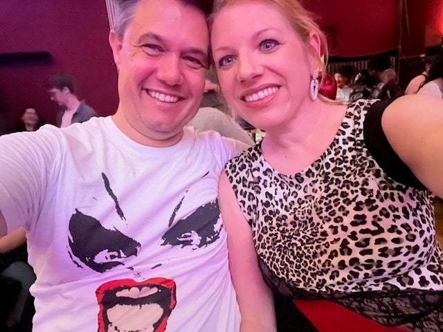 The author in 2025, healthier and happier at "Hairspray" with her husband.