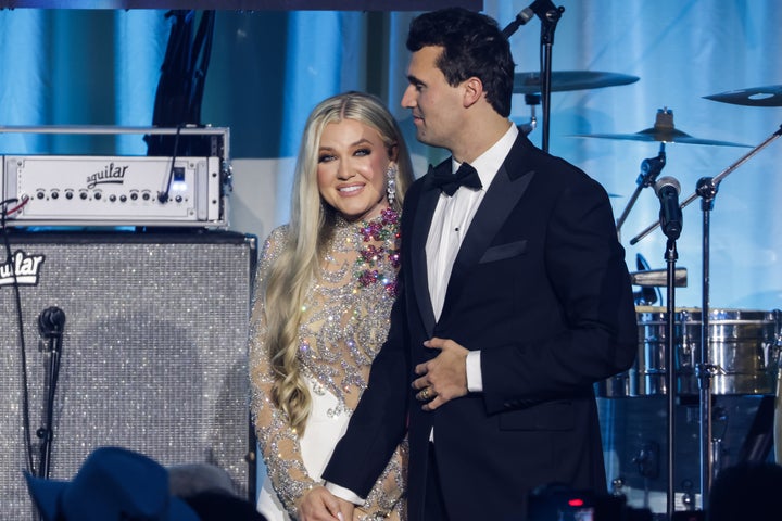 Kirk and his wife Erika Lane Frantzve on stage during the Turning Point USA Inaugural-Eve Ball in January.