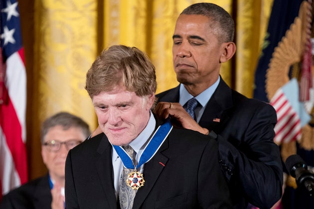 President Barack Obama presents the Presidential Medal of Freedom to Robert Redford during a ceremony in the East Room of the White House in 2016.
