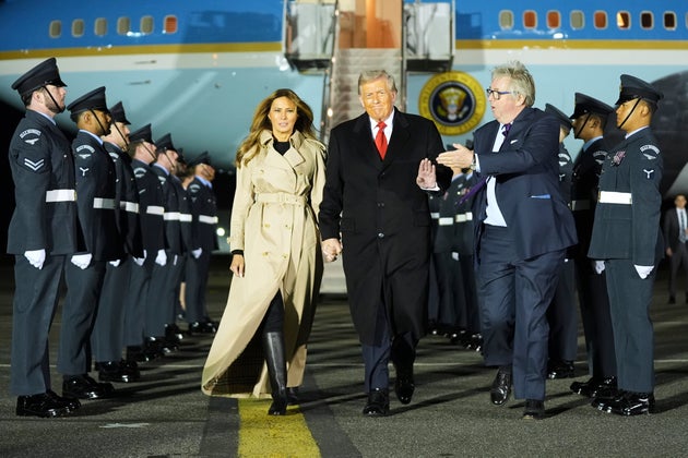 President Donald Trump and first lady Melania Trump are greeted by The Viscount Hood, Lord-in-Waiting, center-right, as they arrive at Stansted Airport near London, Tuesday, Sept. 16, 2025. 