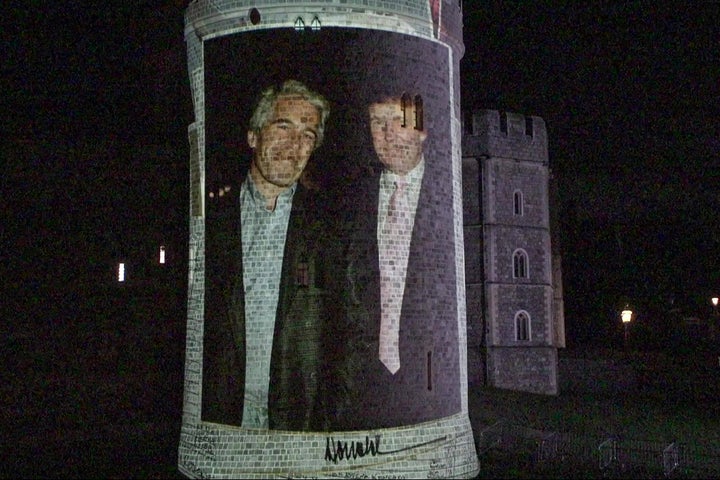 This frame grab made on September 17, 2025 from an AFP video footage dated from Sept. 16, 2025 shows an image projected onto a tower of Windsor Castle bearing a portrait of notorious sex offender Jeffrey Epstein and President Donald Trump, during an action by activists from the British group Led by Donkeys on the sidelines of Trump's state visit to Britain.