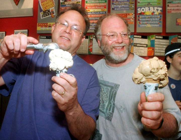 Jerry Greenfield and Ben Cohen scoop ice cream cones during their 20th anniversary party at a scoop shop in Burlington, Vt., in this May 5, 1998 photo.