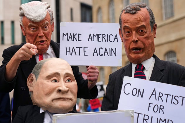 Protesters wear masks of politicians during a demonstration of the Stop Trump Coalition group against President Donald Trump's state visit in London, Wednesday, Sept. 17, 2025