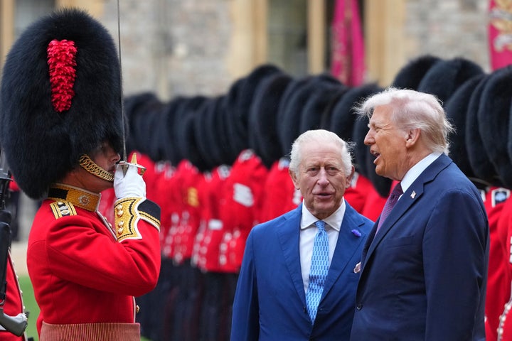 President Donald Trump and Britain's King Charles III review the Guard of Honour after the arrival at Windsor Castle in Windsor, England, on Sept. 17, 2025.