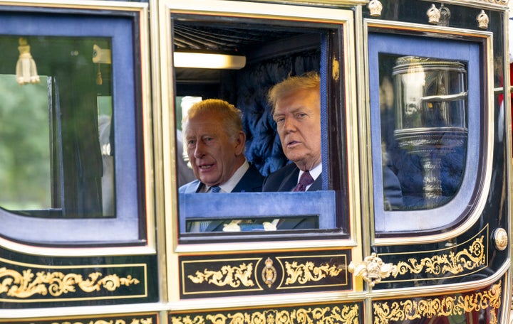 King Charles III and U.S. President Donald Trump in a horse drawn carriage during the State visit at Windsor Castle on Sept. 17, 2025 in Windsor, England.