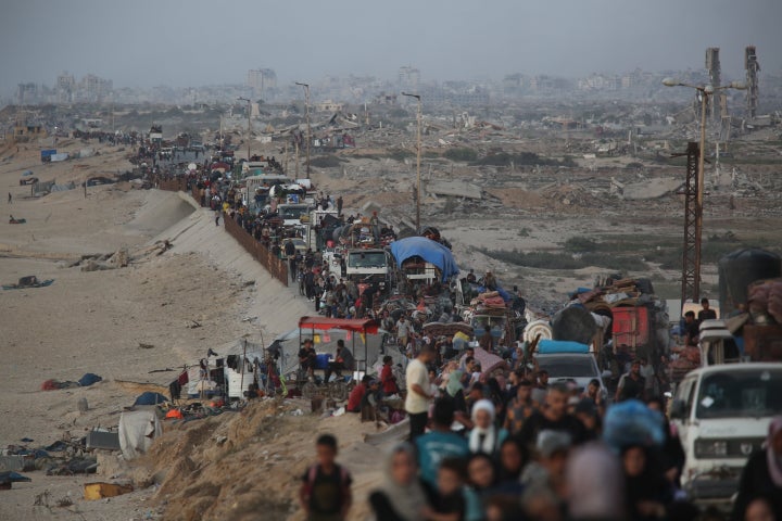 The Palestinians flee with their belongings loaded in vehicles and cars while others walk along Rashid Street to southern Gaza, after intensified Israeli air attacks and evacuation orders in the areas of the north of the enclave in the city of Gaza, Gaza, on September 17, 2025.