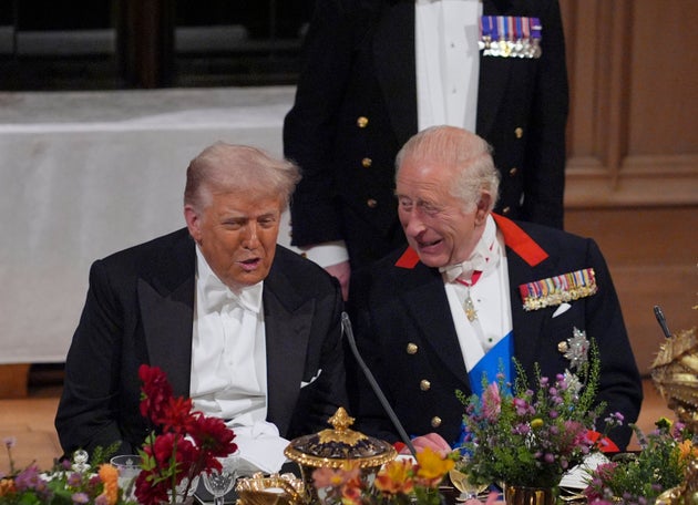 US President Donald Trump, left, and Britain's King Charles speak during the State Banquet in Windsor Castle, England.