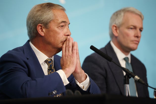 MP Danny Kruger (R) of East Wiltshire announces his defection from the Conservatives to Reform UK at a press conference hosted by Reform UK leader Nigel Farage at the May Fair hotel on September 15, 2025