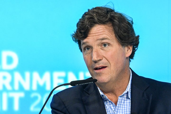 Tucker Carlson speaks at a panel session during the World Government Summit in Dubai on February 12, 2024. (Photo by RYAN LIM/AFP via Getty Images)
