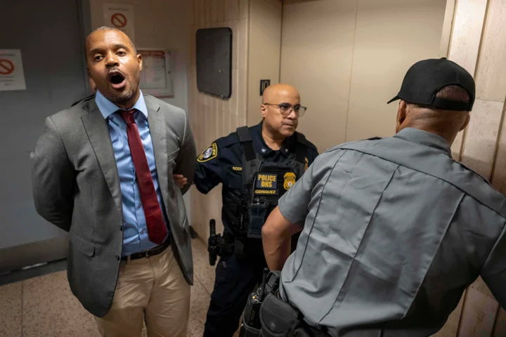 Officials arrested in Manhattan