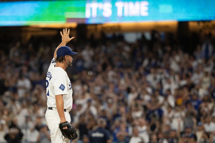 Los Angeles Dodgers starting pitcher Clayton Kershaw (22) waves toward the stands before a baseball game against the San Francisco Giants in Los Angeles, Friday, Sept. 19, 2025. (AP Photo/Kyusung Gong)