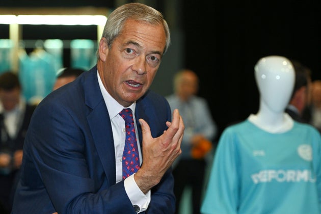 Reform UK party leader Nigel Farage gestures as he speaks during the Reform party's annual conference at the National Exhibition Centre in Birmingham, England, Saturday, Sept. 6, 2025.