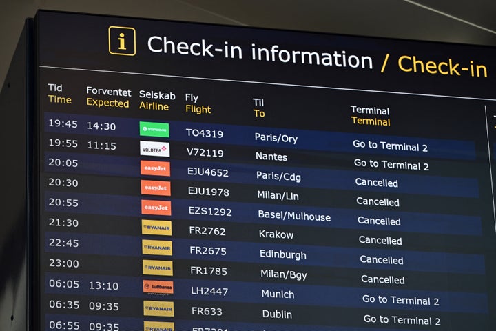 A board displaying flight information at Copenhagen Airport.