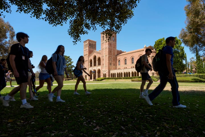 Students walk past Royce Hall at the UCLA campus in Los Angeles, Aug. 15, 2024.