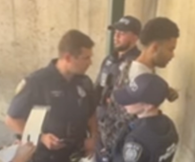 O'Keefe being arrested on a Metro-North train on Thursday.