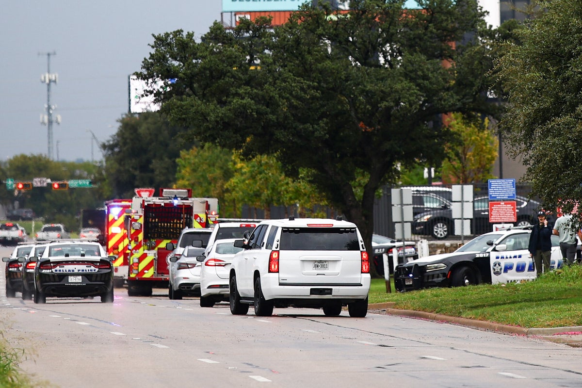 Law enforcement and emergency personnel respond near the scene of a shooting at a US Immigration and Customs Enforcement (ICE) detention facility in Dallas, Texas, on September 24, 2025. (Photo by ARIC BECKER/AFP via Getty Images)