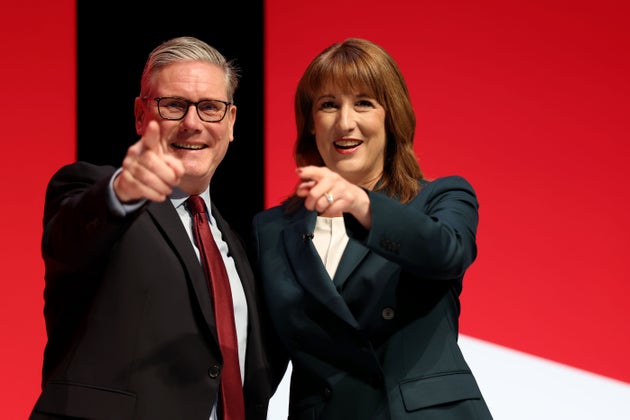 PM Keir Starmer and Chancellor of the Exchequer Rachel Reeves react on stage during day two of the Labour Party conference at ACC Liverpool