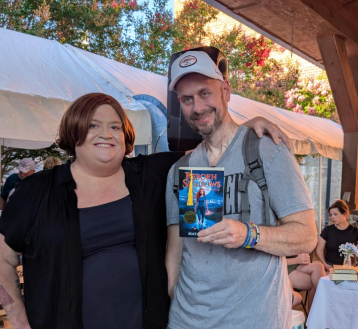 The author with one of her oldest friends, Jason, at the 13th annual Cooks and Books festival in St. Paul, Virginia, in 2025.