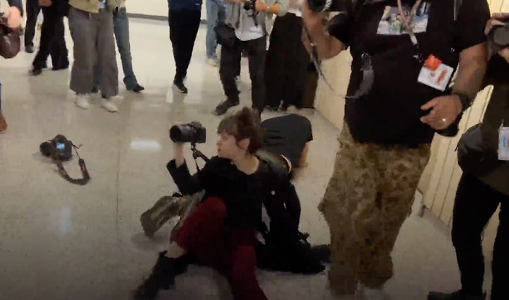 Fedorova, a photojournalist, fell to the ground after getting shoved by a federal officer. 