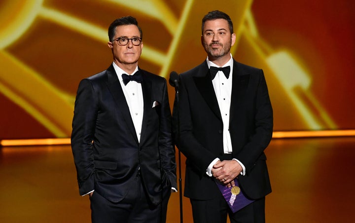 Stephen Colbert and Jimmy Kimmel attend the Emmy Awards in Los Angeles in September 2019.