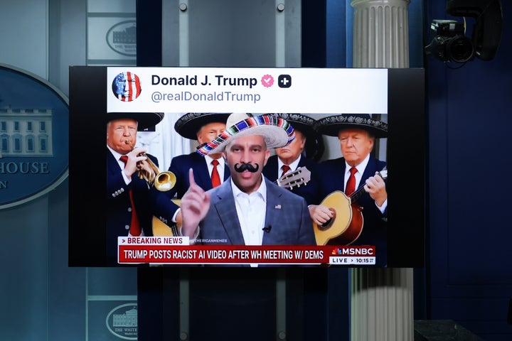 A screen displays one of the AI-modified videos of House Minority Leader Hakeem Jeffries that were shared on social media by Trump in the Brady Press Briefing Room at the White House on Wednesday in Washington, D.C.